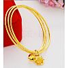 Brass Bell & Flower Charms Triple Loops Bangle JB764A-1